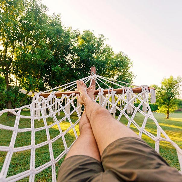 Person relaxing on a hammock